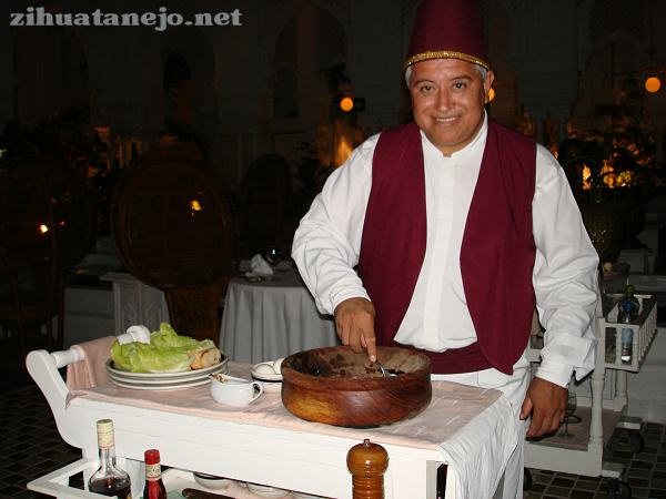 Audal preparing a Caesar Salad at Bogart's